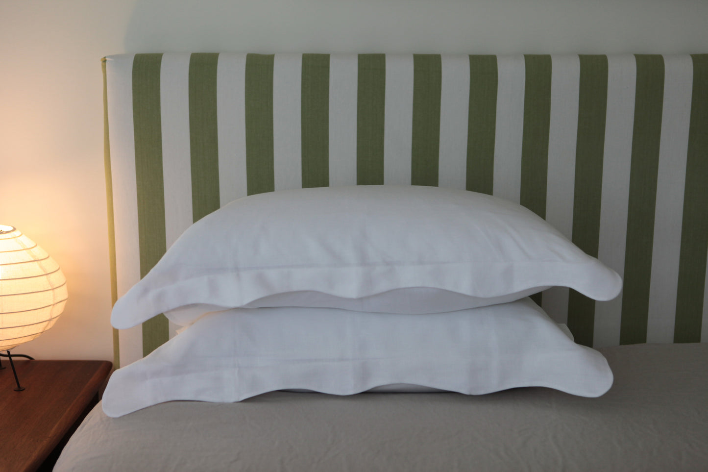 White linen pillowcases with organic wave edge. Wide angle photo.