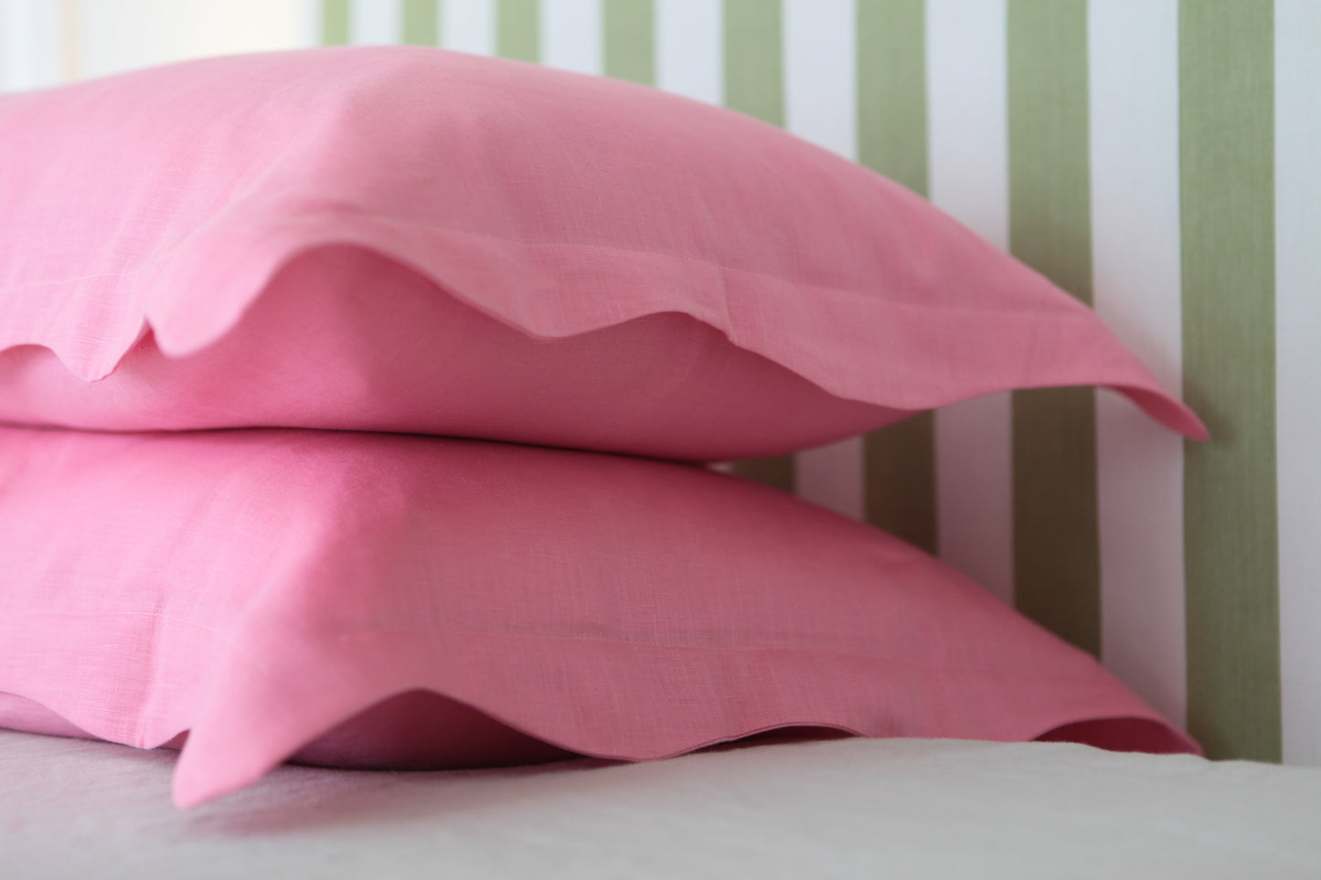 pink wiggle edge pillowcase shot from 45 degree angle. 