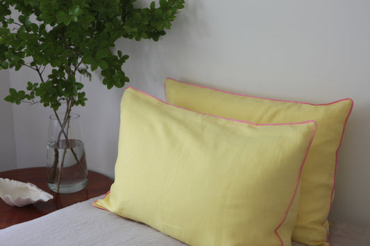 Lemon linen pillowcases with baby pink piping. 
